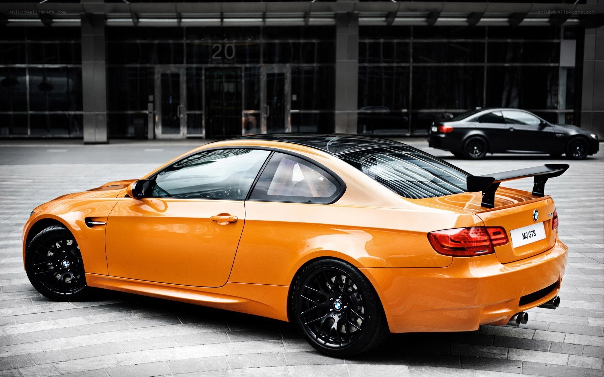 orange BMW M3 GTS car
