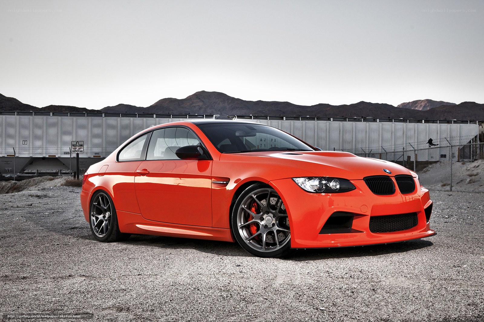 Orange BMW M3 in desert