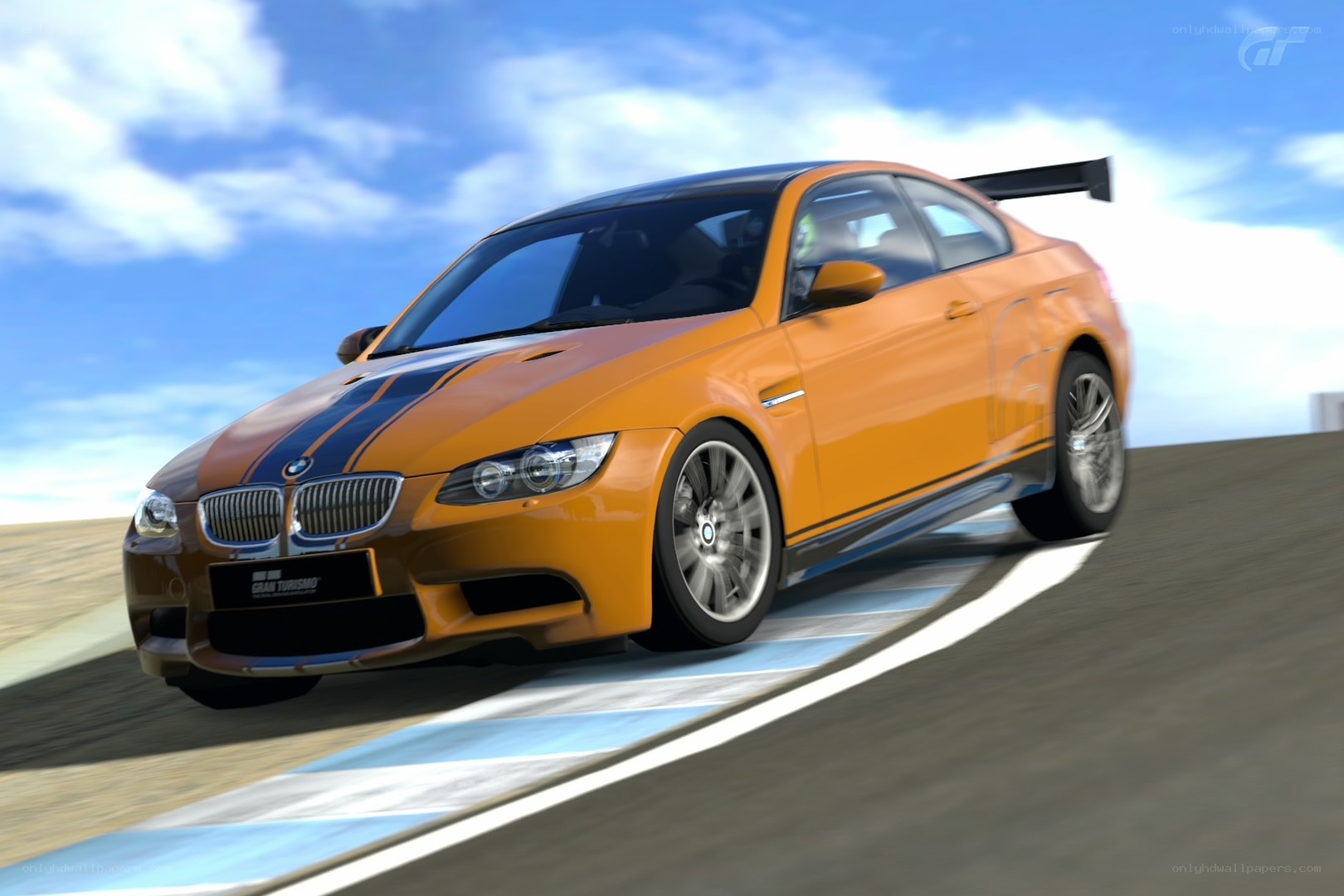 Orange BMW M3 on a racetrack