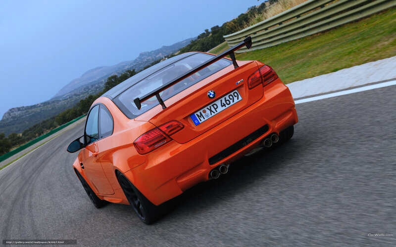 orange bmw m3 on racetrack