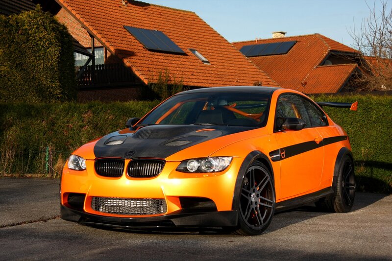 Orange BMW M3 with carbon fiber