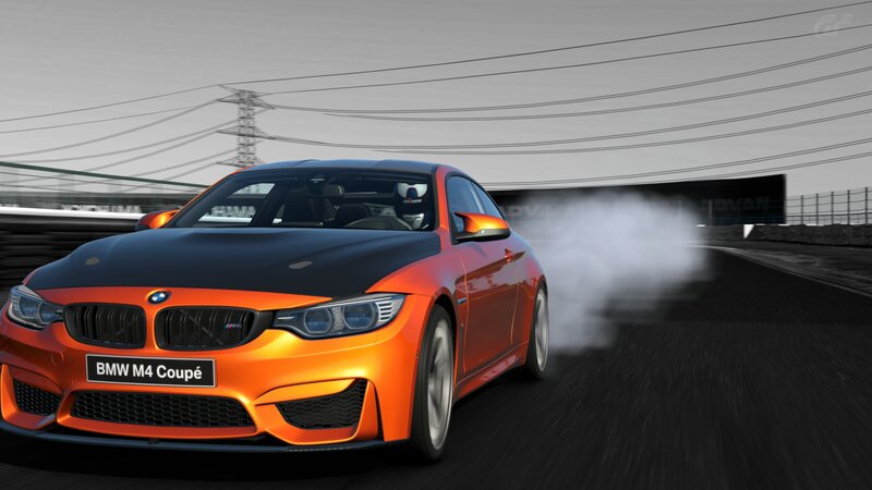 Orange BMW M4 Coupe — Dynamic