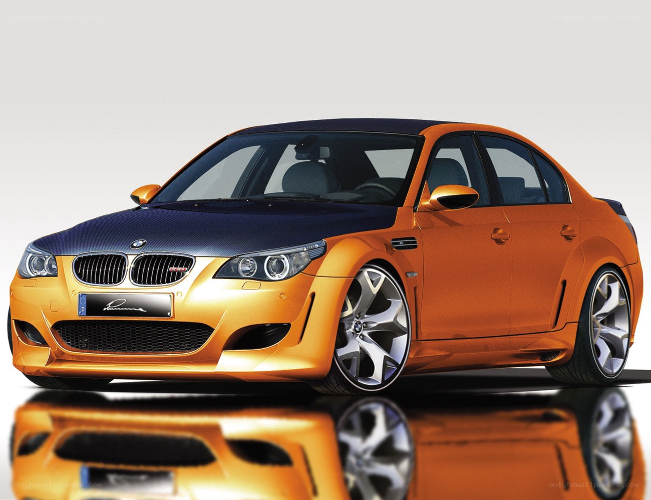 Orange BMW M5 sedan