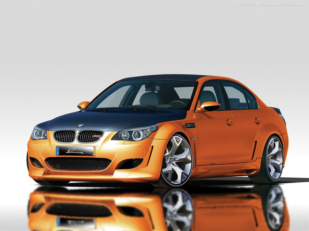 orange BMW M5 sedan