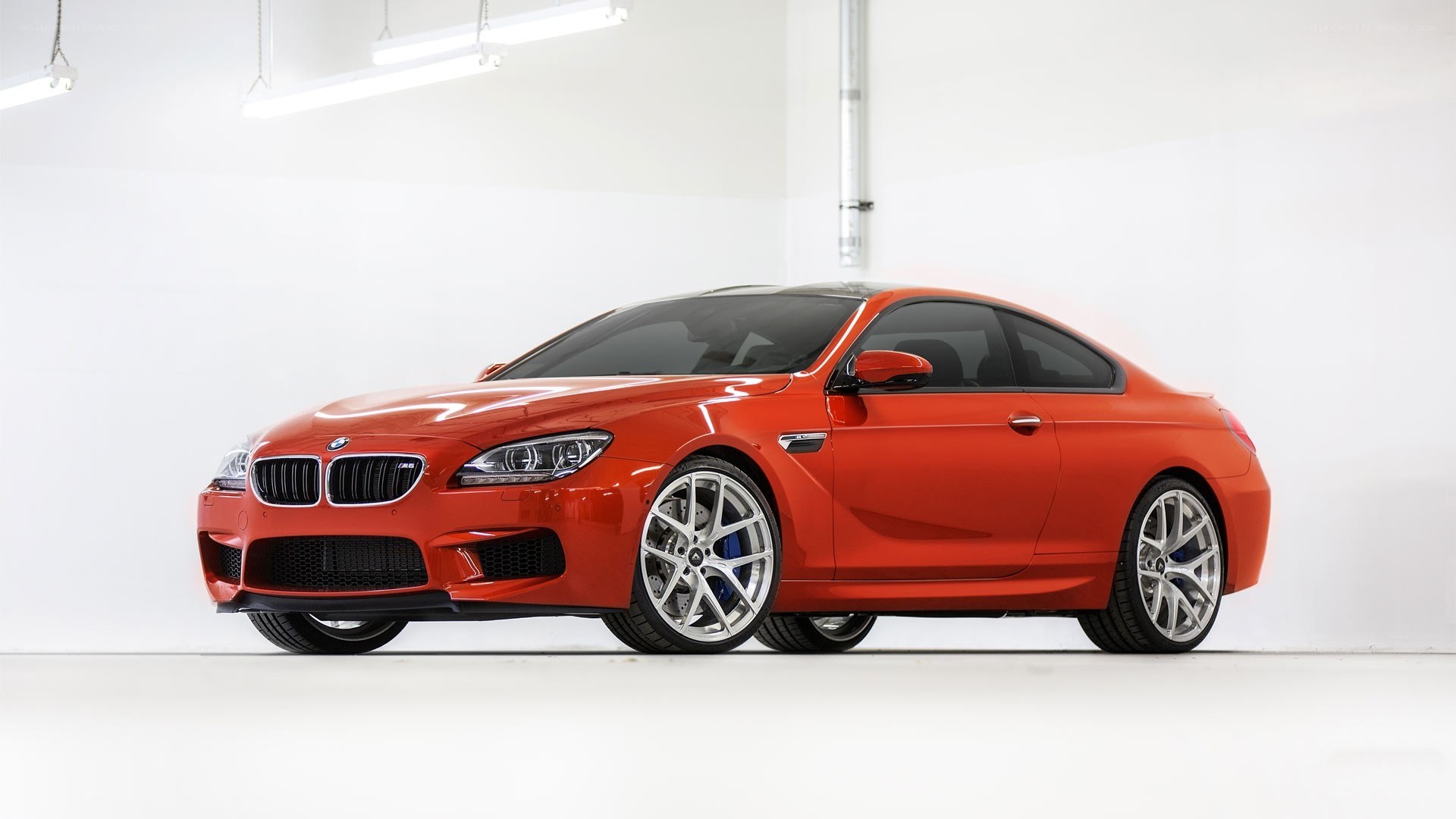 orange bmw m6 coupe
