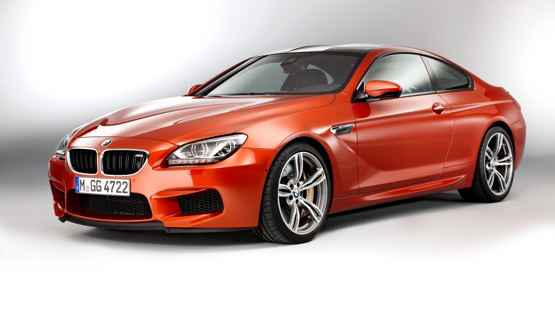 orange BMW M6 coupe