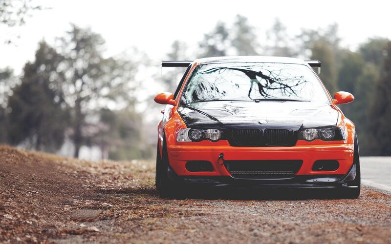Orange BMW Race Car — Dramatic, Autumn