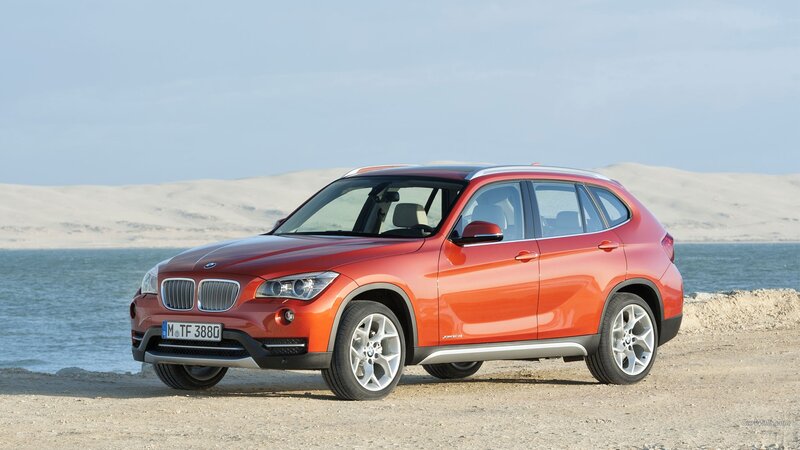 Orange Bmw Suv — Serene