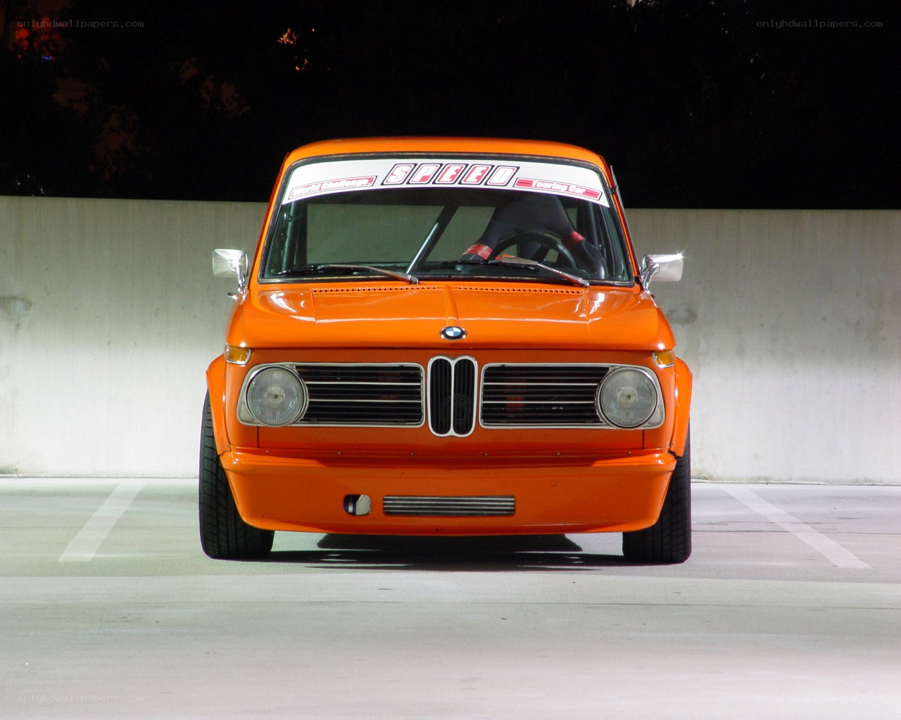 orange bmw touring car