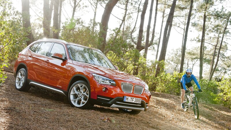 Orange BMW X1 Car