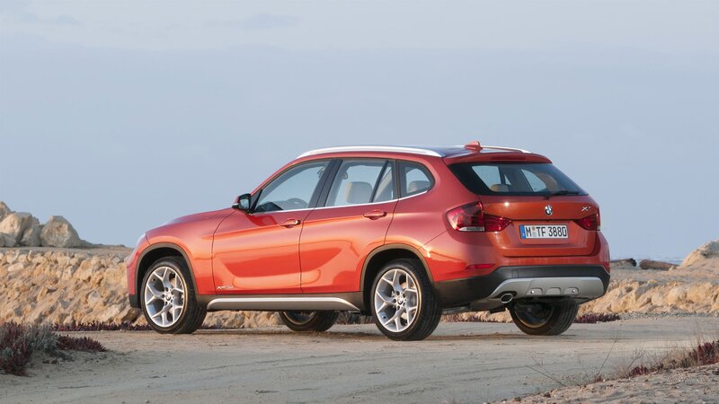 Orange BMW X1 SUV — Red
