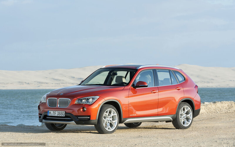 Orange BMW X1 SUV — Serene, Afternoon