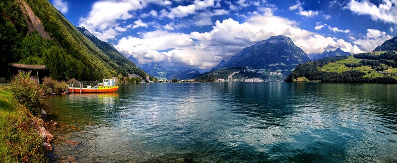 Orange Boat on Lake — Blue, Serene