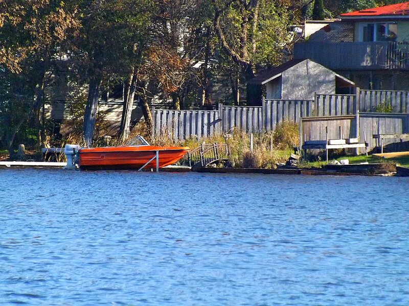 Orange Boat on Lake — Blue