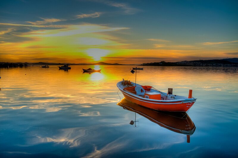 Orange Boat on Water — Blue
