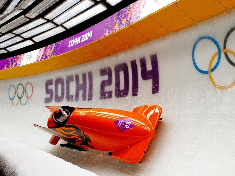 Orange Bobsled on Ice — Competitive, Photograph