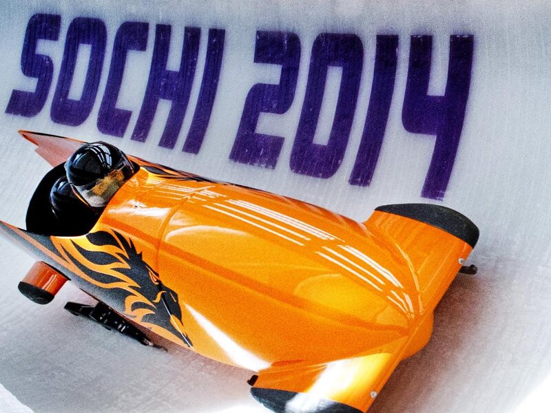Orange Bobsled on Ice — Competitive