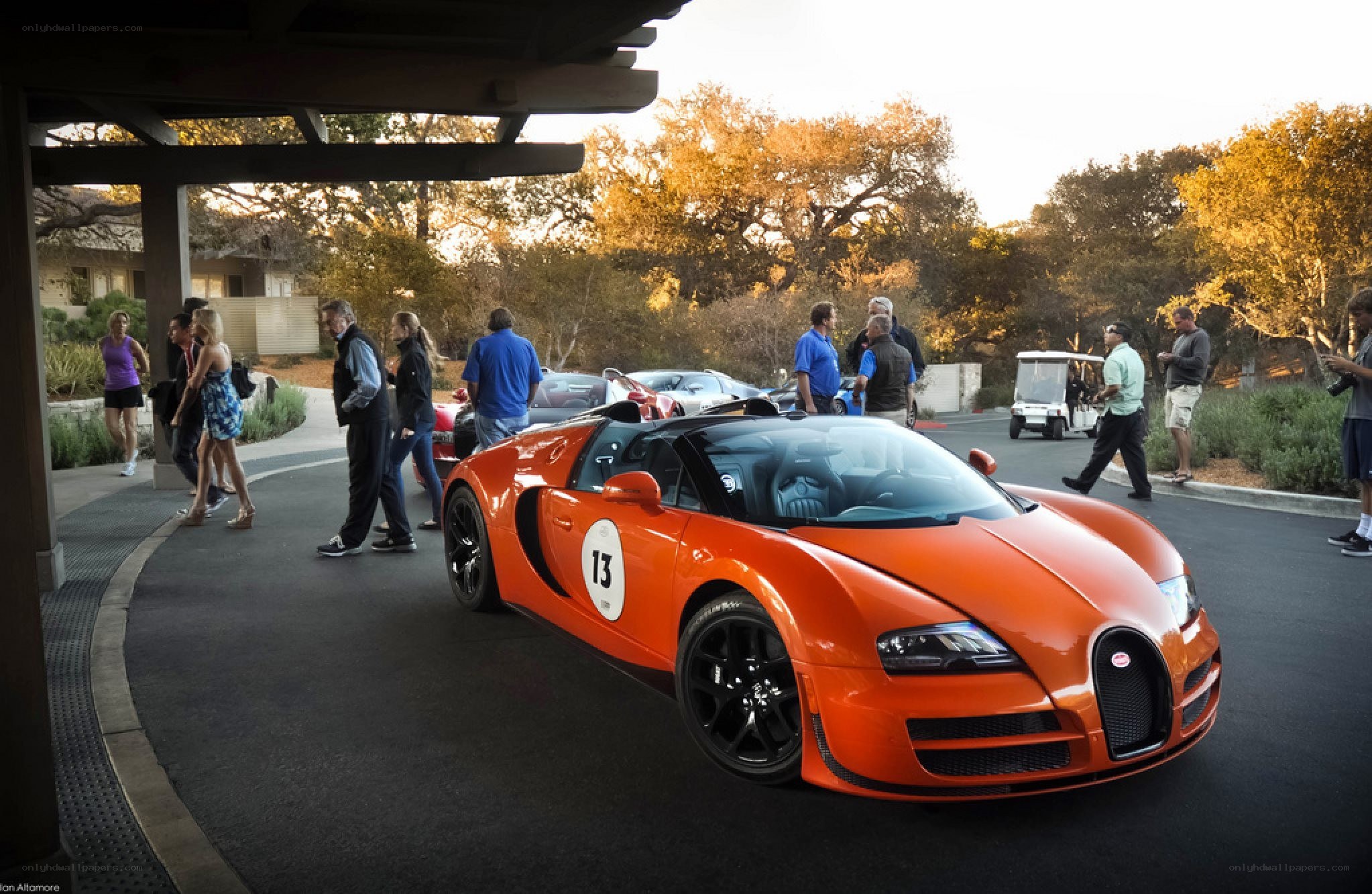 Orange Bugatti Veyron at event