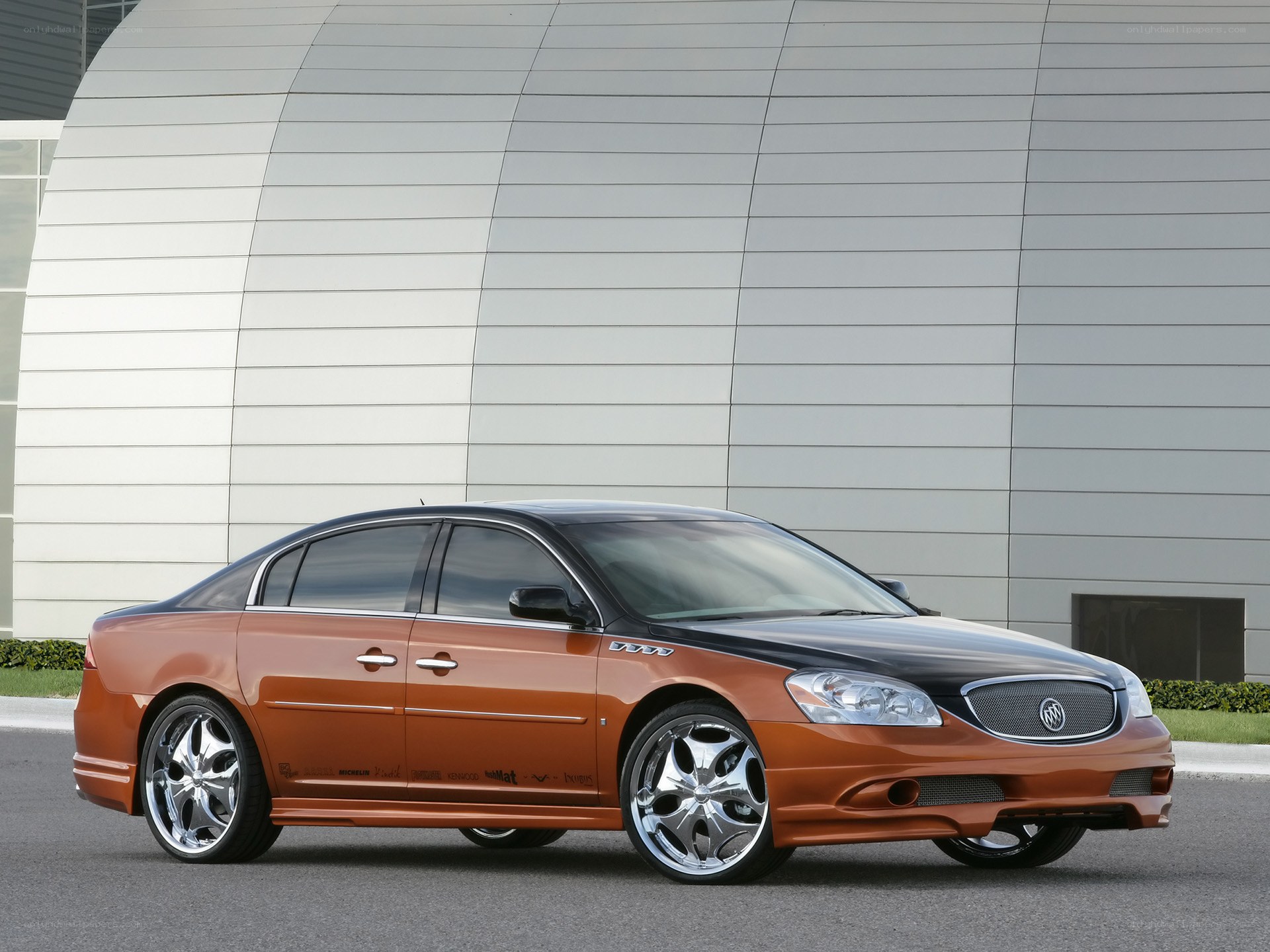 Orange Buick Lucerne sedan