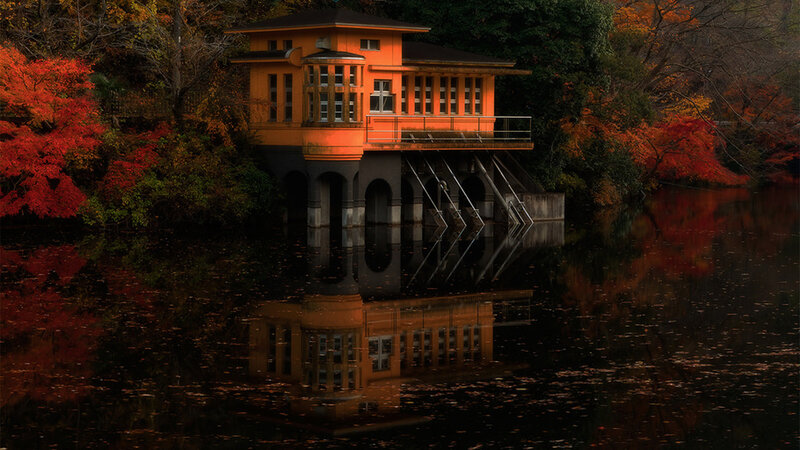 Orange Building on Water — Serene