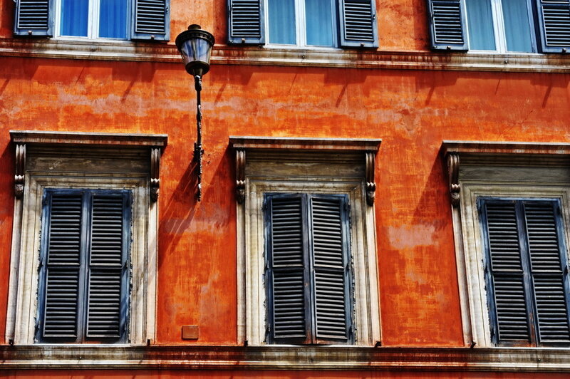 orange building with shutters
