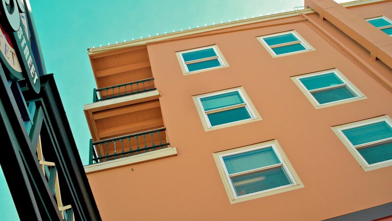 orange building with teal windows