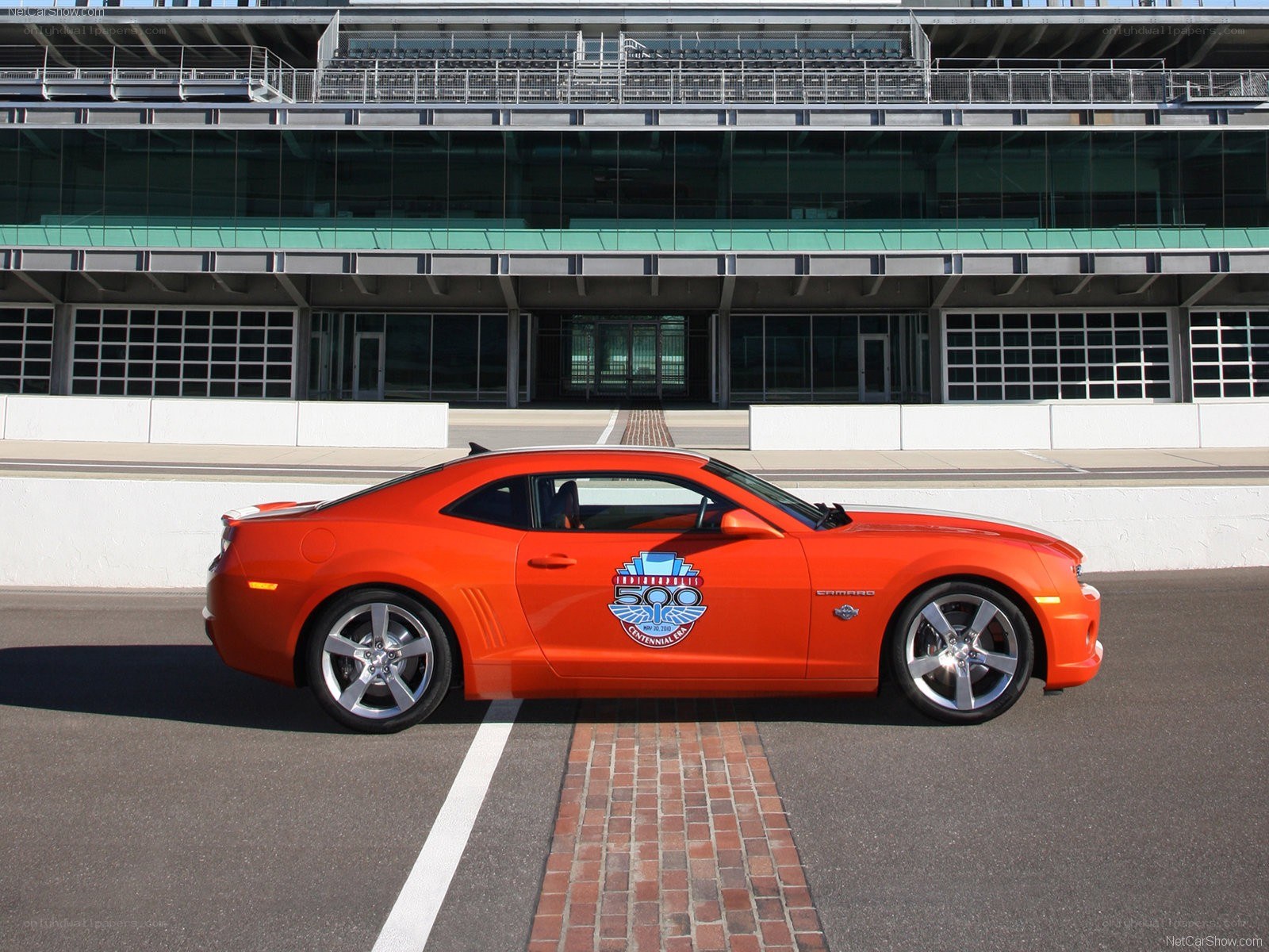 Orange Camaro at racetrack
