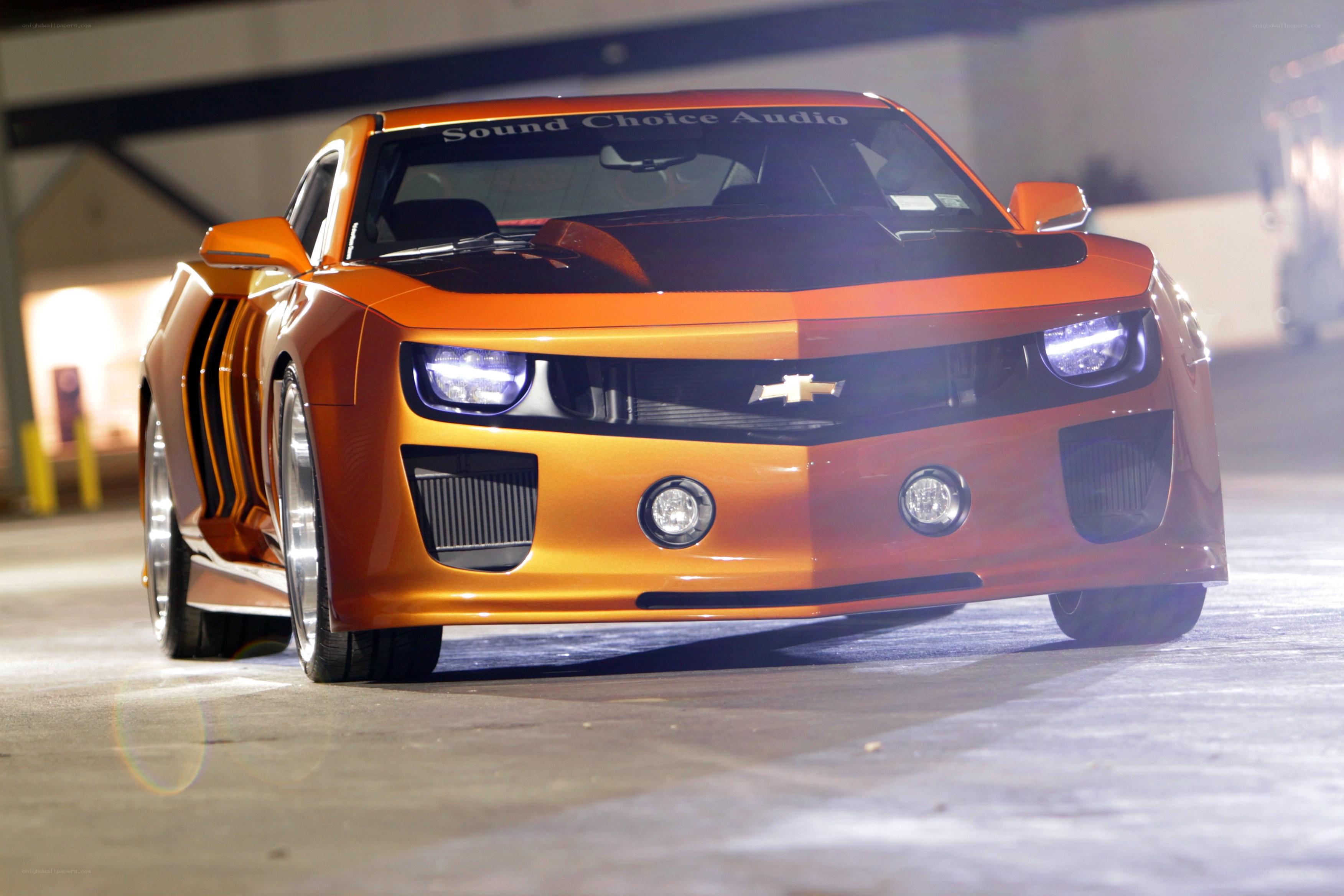 Orange Camaro in Garage