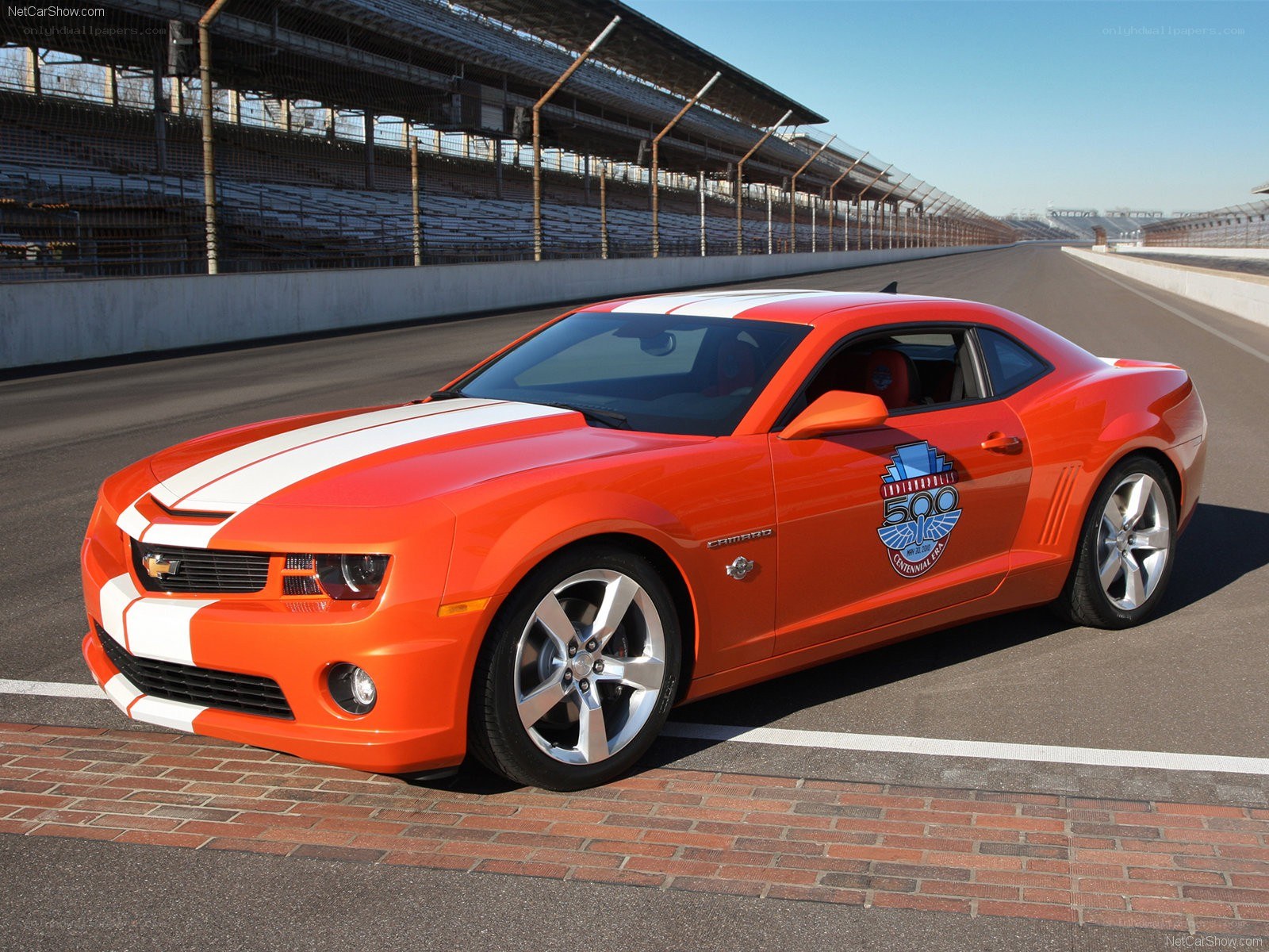 Orange Camaro on a racetrack
