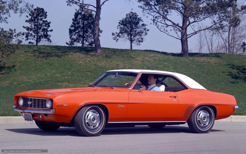 Orange Camaro on a sunny day