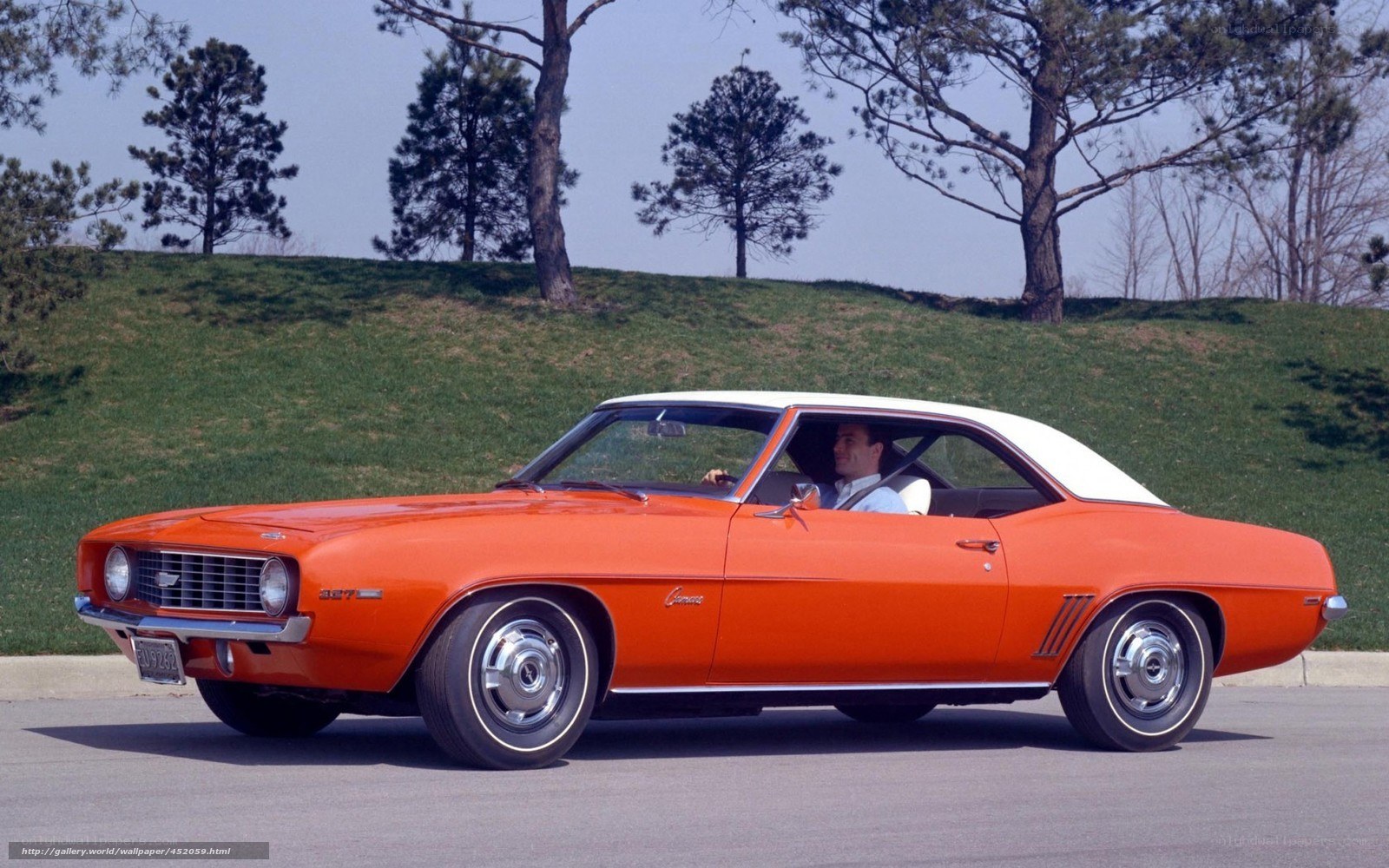 Orange Camaro on a sunny day
