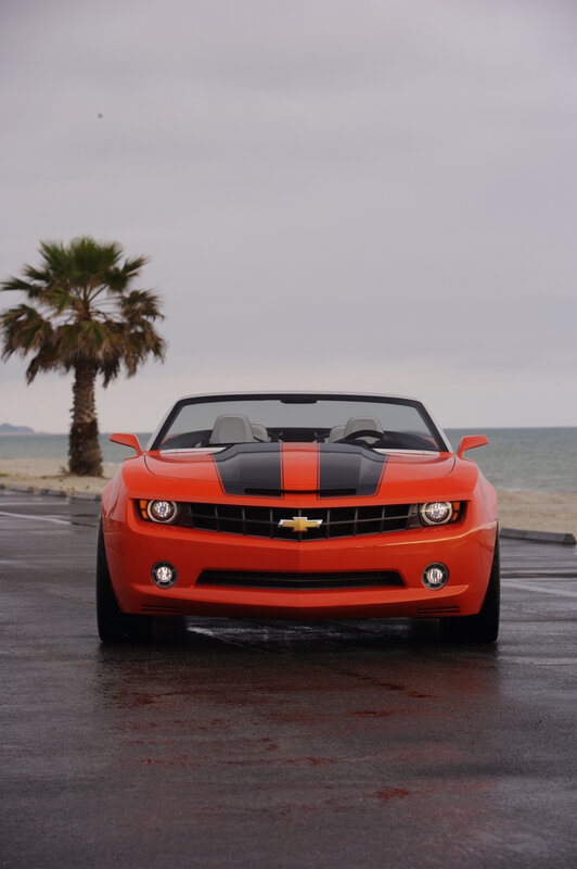 Orange Camaro on beach