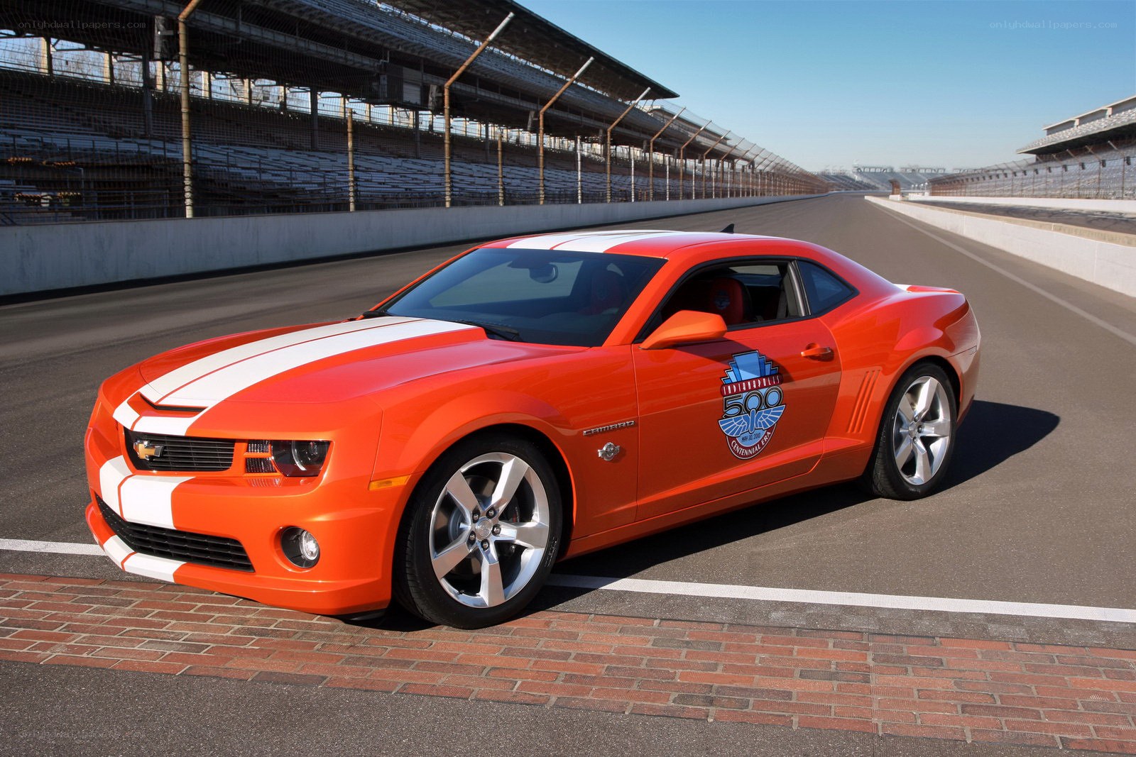 Orange Camaro on racetrack