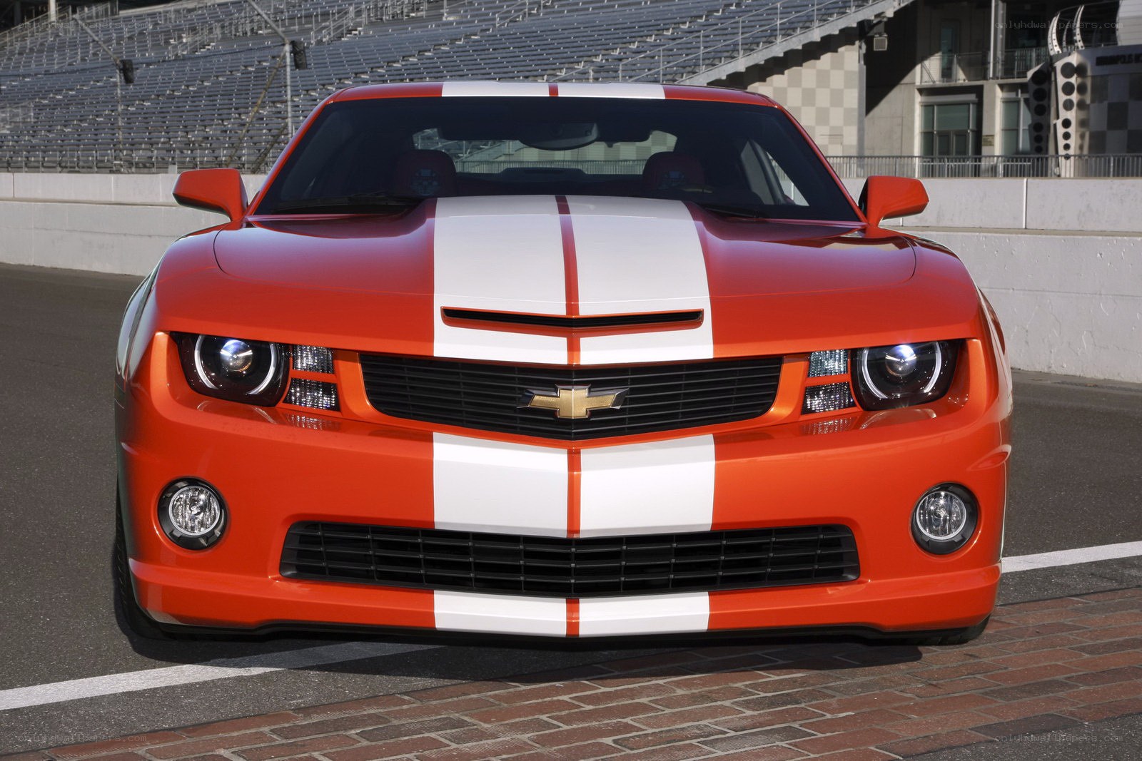 Orange Camaro on racetrack