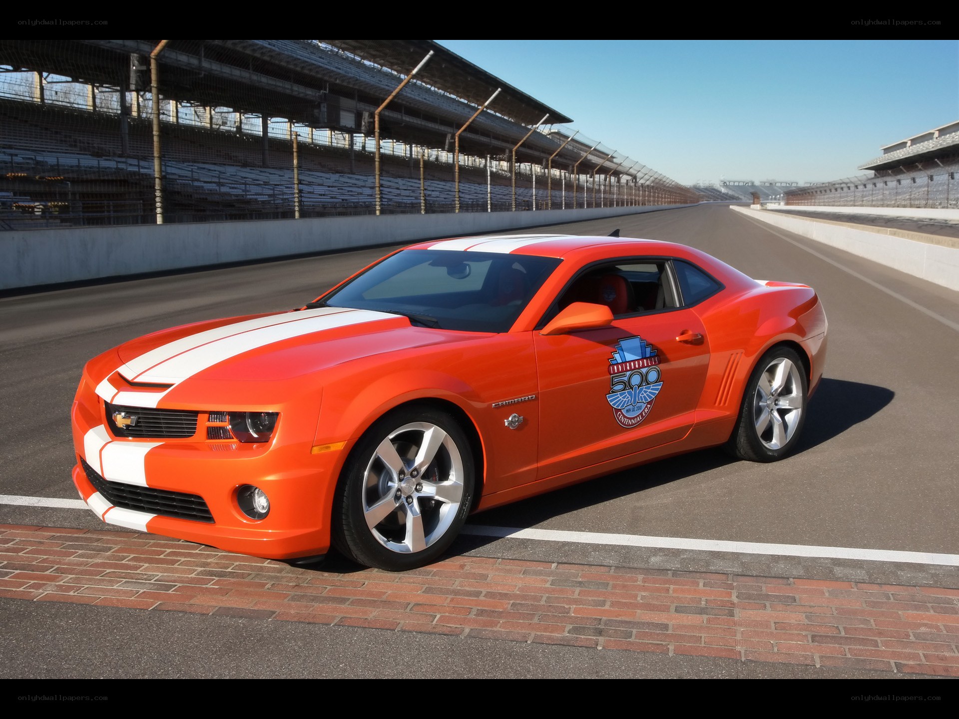 Orange Camaro on racetrack