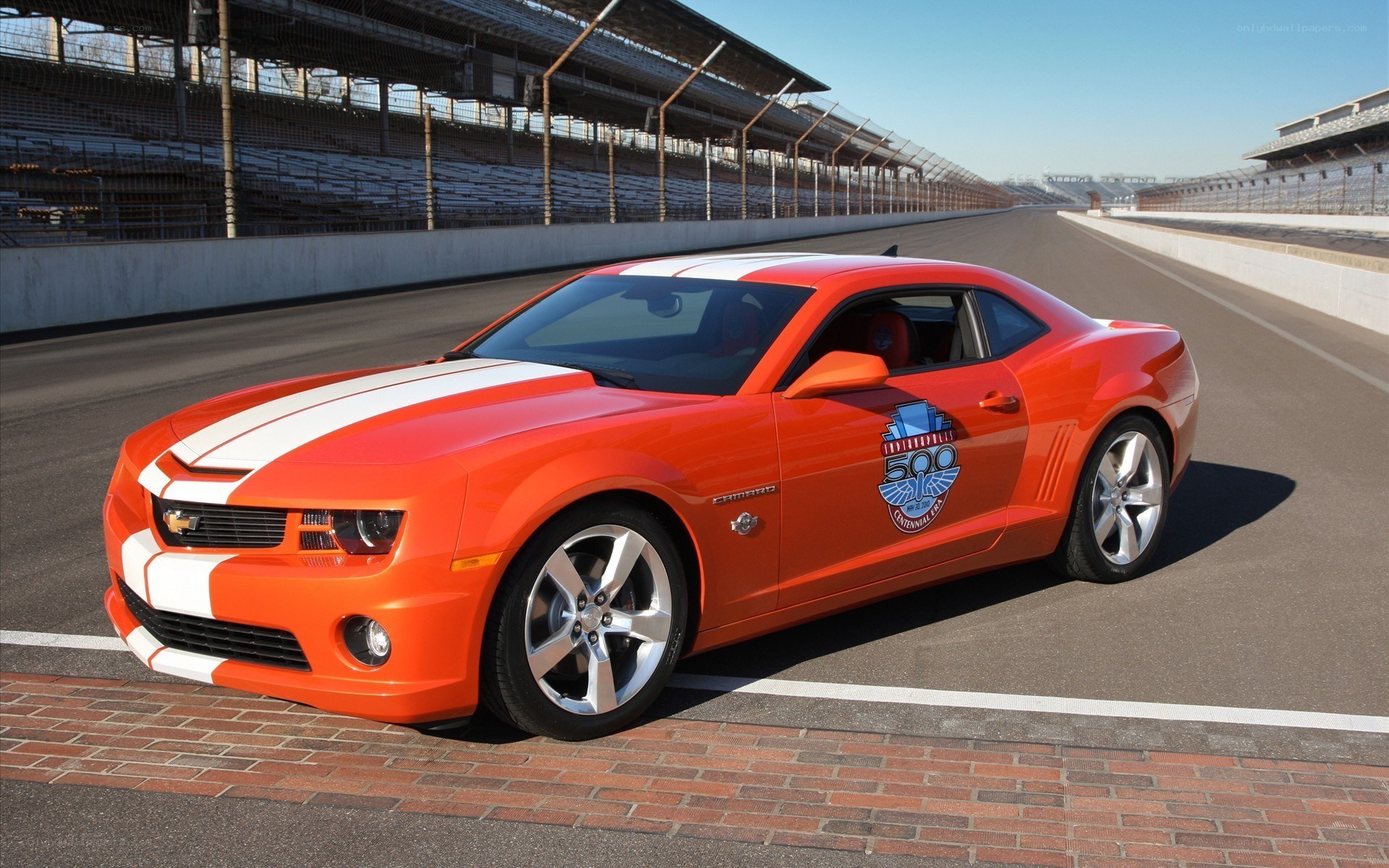 Orange Camaro on racetrack
