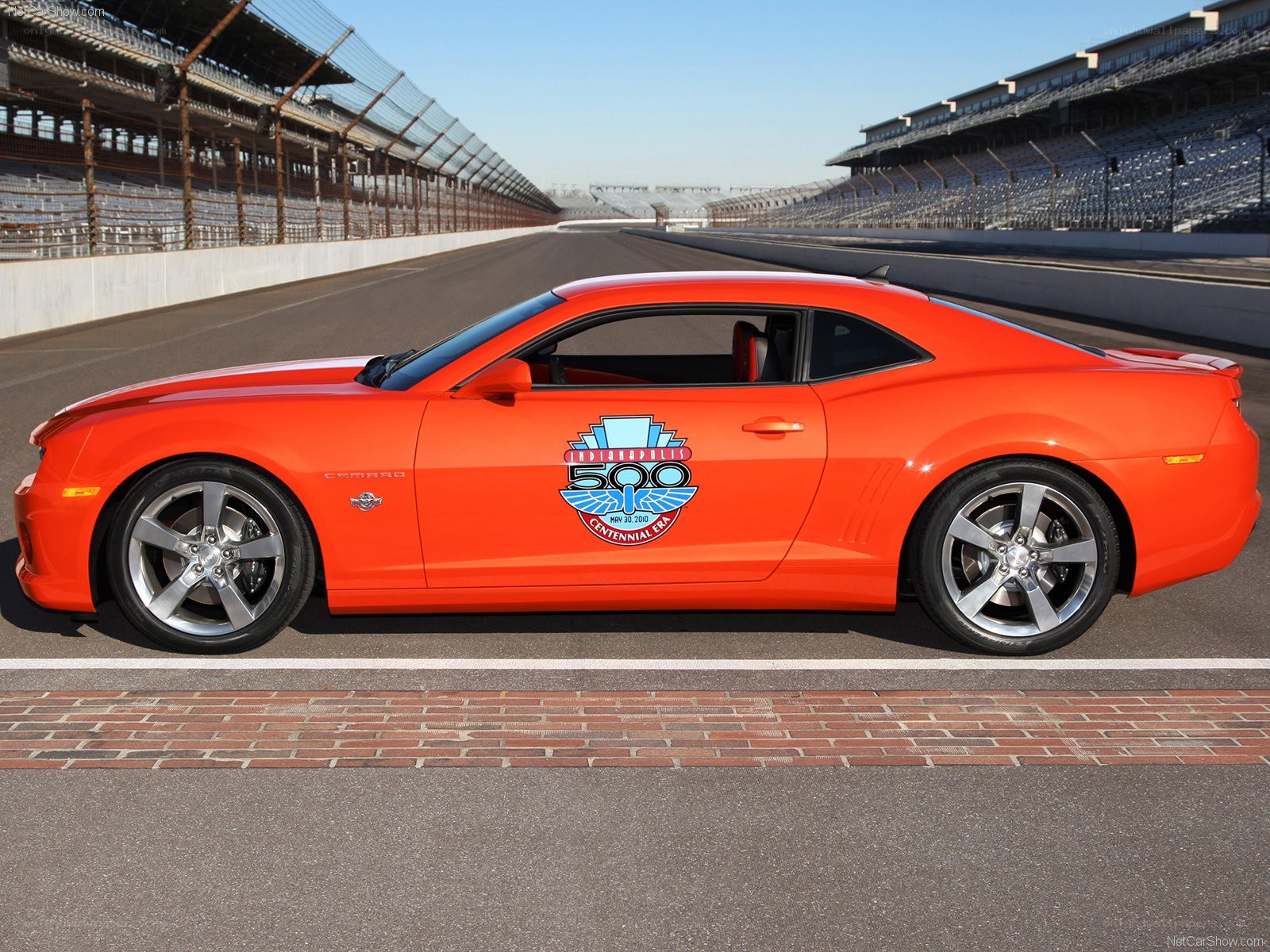 Orange Camaro on racetrack