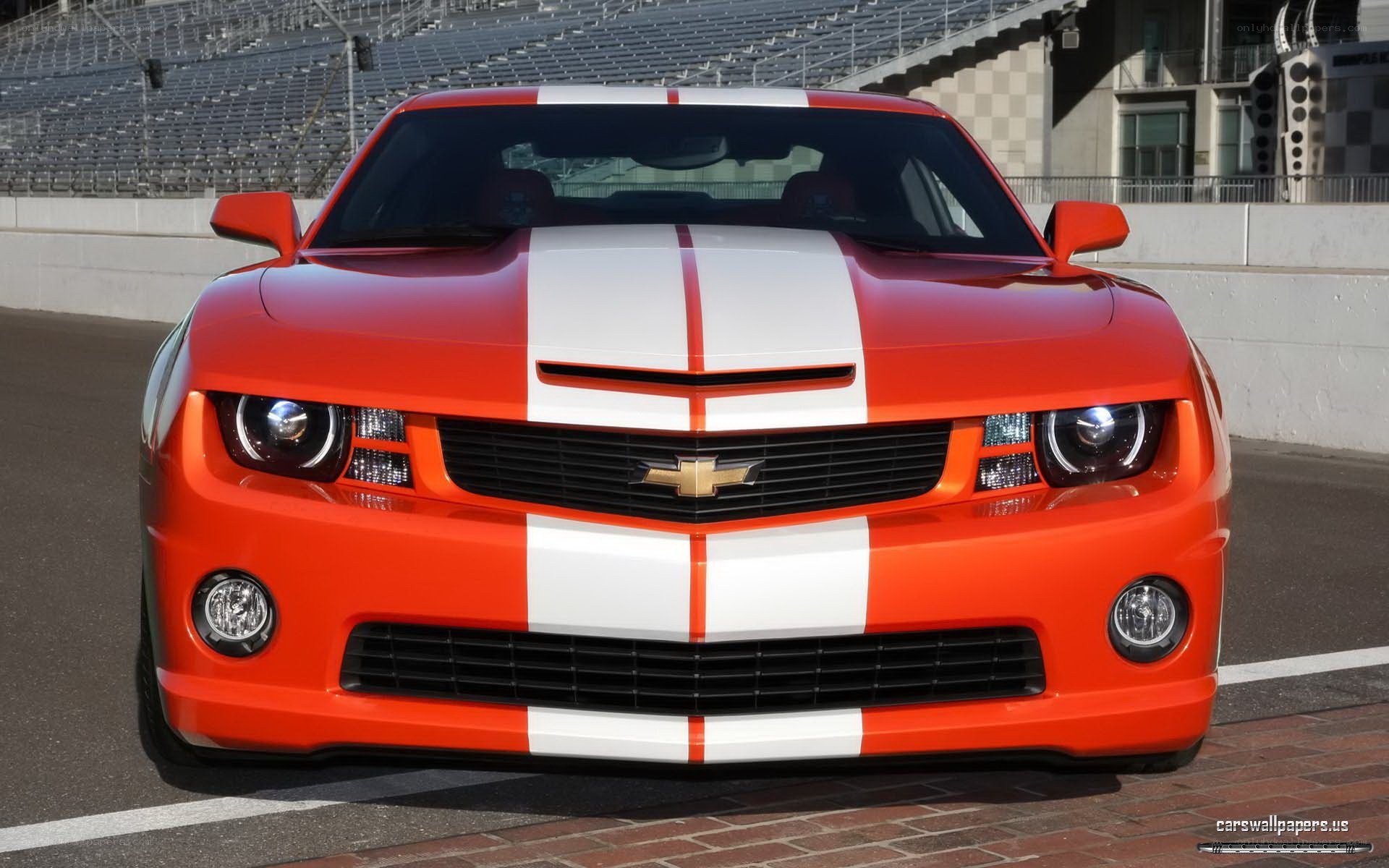 orange camaro on racetrack