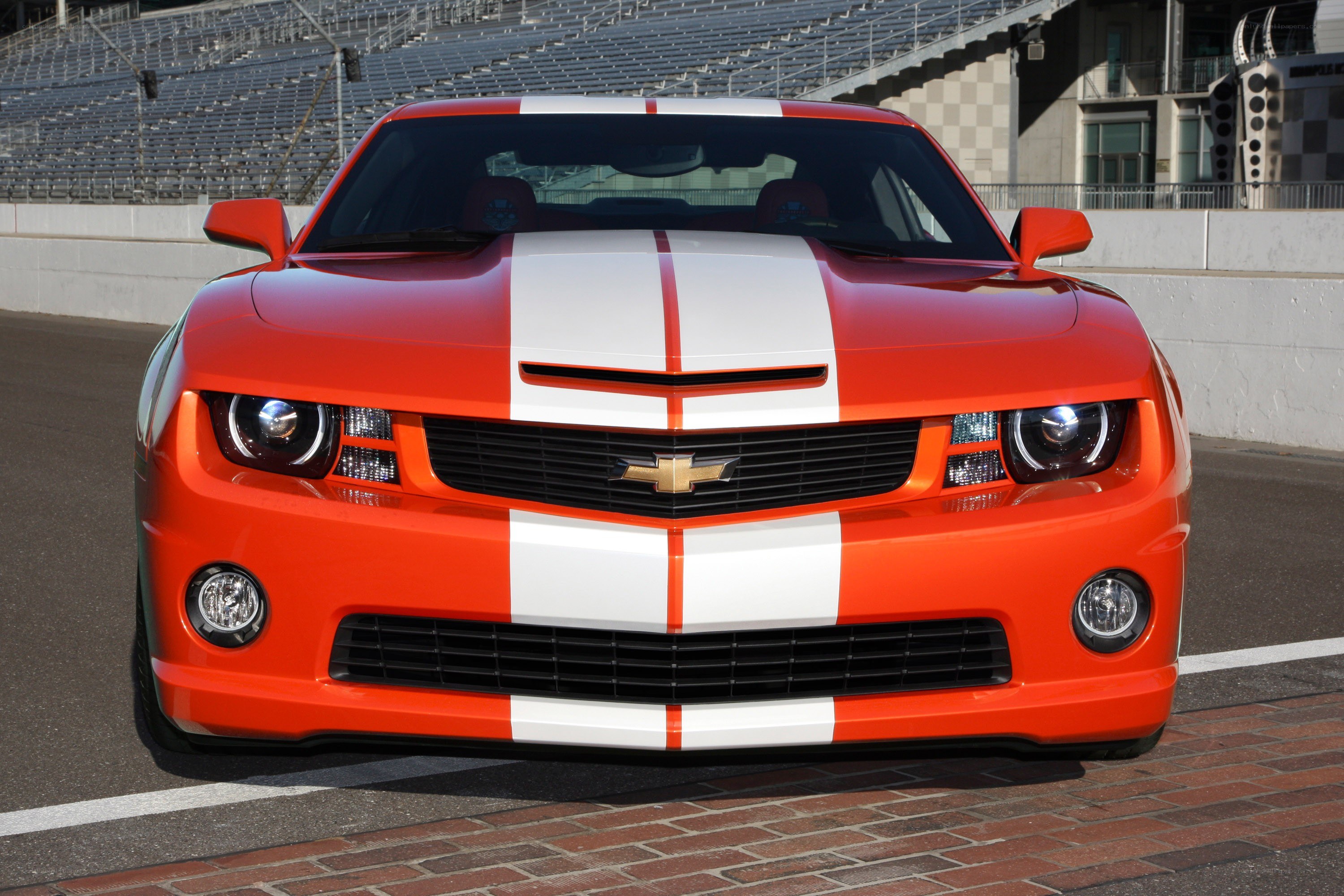 Orange Camaro on racetrack