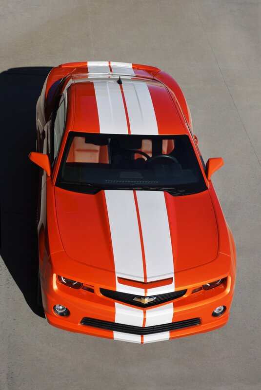 Orange Camaro with racing stripes