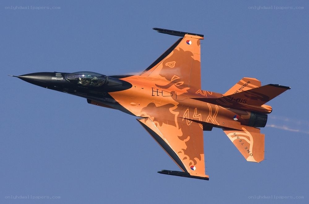 orange camouflaged fighter jet