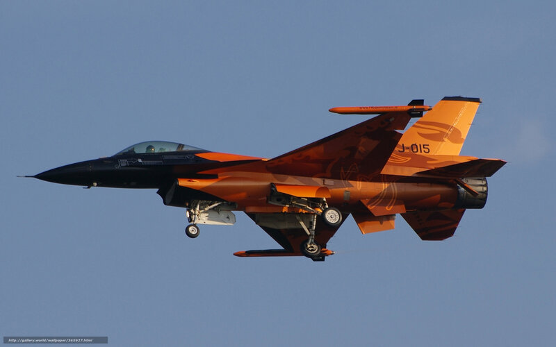 orange camouflaged fighter jet