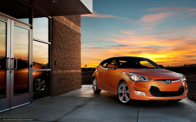Orange car at sunset