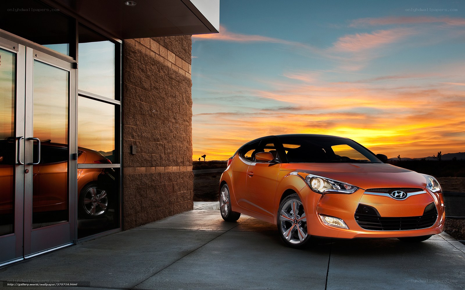 Orange car at sunset