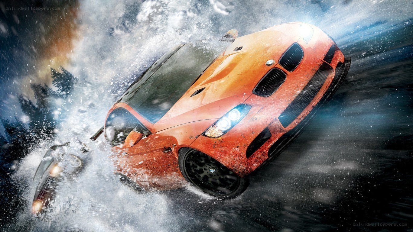 Orange car drifting in snow