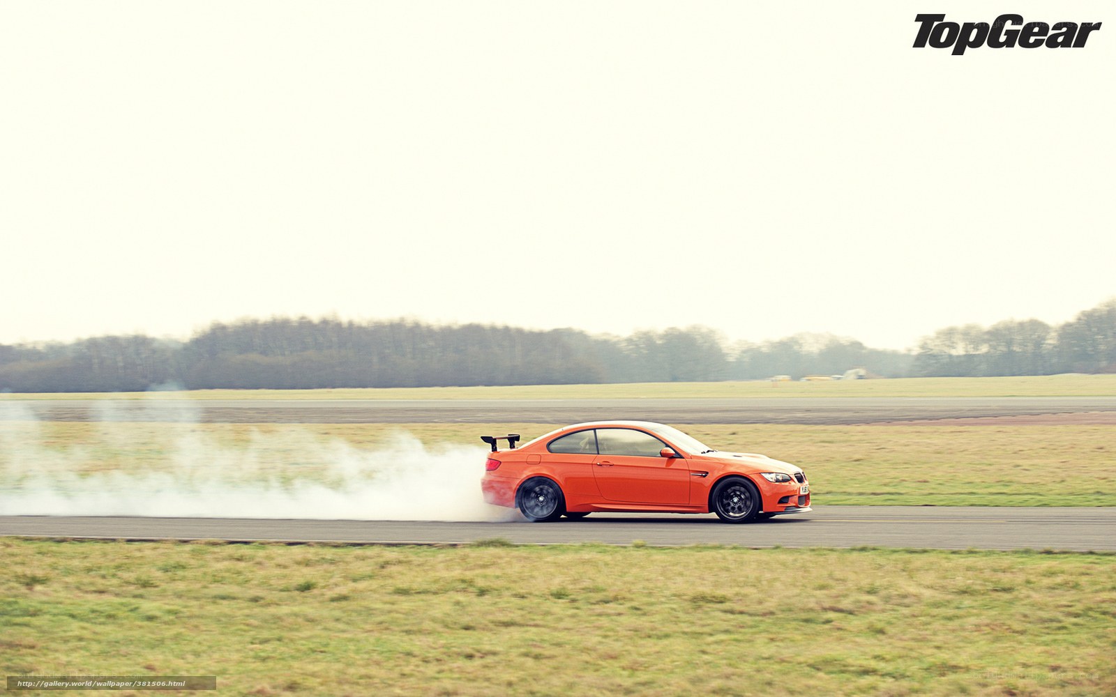 Orange car drifting on track