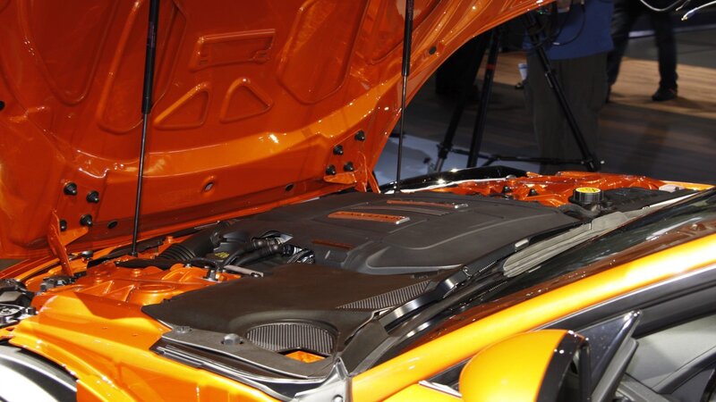 orange car engine bay