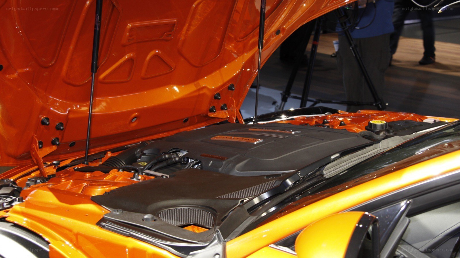 orange car engine bay