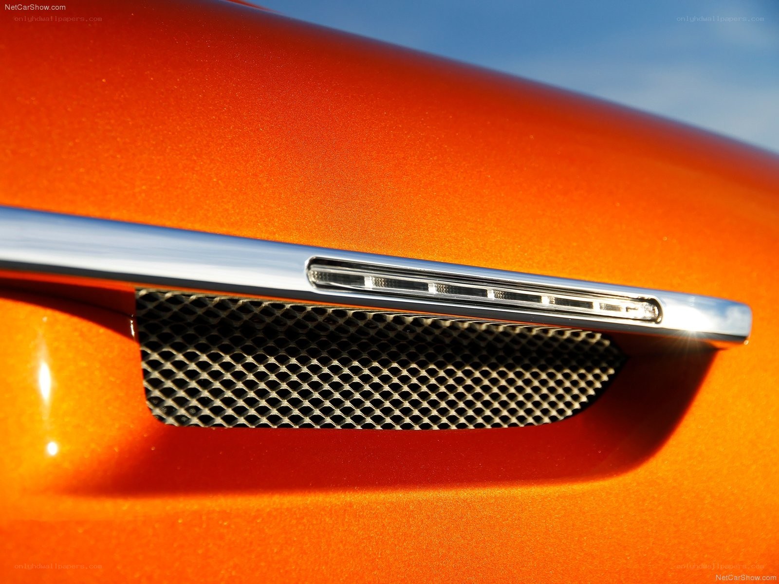 orange car grille detail