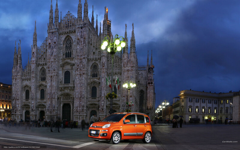 Orange car in front of Milan Cathedral